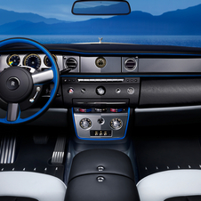 The design also extends to the steering wheel, which features blue accents combined with black leather