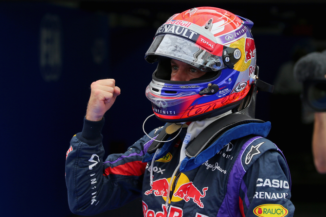 Vettel celebrates his third consecutive pole position