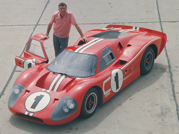 Shelby posing with the GT40 Mk.IV that ran in two races the 12 Hours of Sebring and 24 Hours of Le Mans and won both