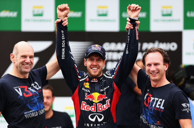 Sebastian Vettel, Christian Horner and Adrian Newey celebrate the win